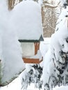 Snowstorm emptied bird feeders and left piles of snow Royalty Free Stock Photo