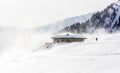 Snowstorm in the mountains at winter time. Mountains of Trentino Alto Adige, South Tyrol Royalty Free Stock Photo