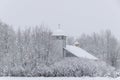 snowstorm at the Old Believers\' House of Prayer in winter Royalty Free Stock Photo