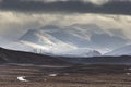 Snowstorm over the Cairngorm Mountains from Dava Moor in Scotland. Royalty Free Stock Photo