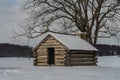 Snow Covered Log Cabin at Valley Forge Royalty Free Stock Photo