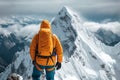 Snowy adventure Man conquers icy peaks in a winter climbing