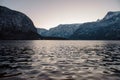 Snowy alpine hills over lake in Hallstatt at evening time Royalty Free Stock Photo