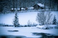 Snowy Alpine house and frozen river in the woods Royalty Free Stock Photo
