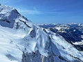 Snowy alpine mountain peak Sex Rouge or Scex Rouge located in a mountain massif Les Diablerets Rochers or Scex de Champ