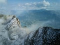 Snowy alpine peaks aerial by Wallensee