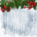 Christmas border with firtree,holly and Christmas wreath on wood Royalty Free Stock Photo