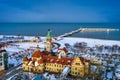 Snowy beach and pier & x28;Molo& x29; in Sopot at winter dusk. Poland Royalty Free Stock Photo