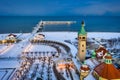 Snowy beach and pier (Molo) in Sopot at winter dusk. Poland Royalty Free Stock Photo