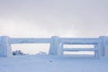 Snowy bench in winter