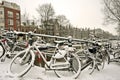 Snowy bikes in Amsterdam the Netherlands