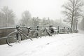 Snowy bikes in Amsterdam the Netherlands Royalty Free Stock Photo