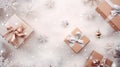 Snowy Christmas background composition with decoration and New Years gift boxes. Flat lay. Top view