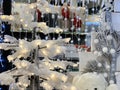 Snowy Christmas tree and glowing garlands Royalty Free Stock Photo