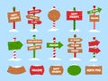 Snowy Christmas wooden signs. Happy winter holidays, Santas house, Xmas elf village, toy shop and welcome pointers with