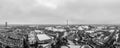Snowy city of the popular tourism city of Munich in January, an aerial overview at wintertime in black and white.