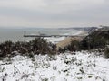 Snowy cliff top view of Bournemouth pier