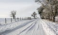 Snowy country lane in Cumbria Royalty Free Stock Photo