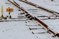 The snowy covered rails road railway in the winter landscape Royalty Free Stock Photo