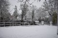 Snowy day in Leamington Spa UK, view of the small bridge over Leam River, Pump Room Gardens - 10 december 2017 Royalty Free Stock Photo