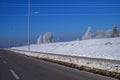 Snowy embankment alongside a motorway