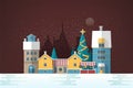 Snowy evening landscape with small European city. Cute houses and holiday street decorations. Gorgeous old town in New Royalty Free Stock Photo