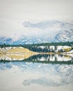 Snowy Fall Reflection on Mountain Lake Royalty Free Stock Photo