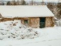 Snowy farm, roof and white ground