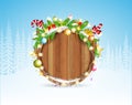 Snowy fir tree branch cones and presents on round wood border. Winter forest christmas background Royalty Free Stock Photo