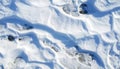 Snowy Footprints Texture in Winter White Surface with Sun Lighting Royalty Free Stock Photo