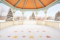 snowy gazebo with starburst-patterned floor