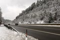 Snowy German highway among woods near Engen, Germany