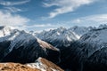 Snowy Greater Caucasus ridge. Sunny day. Before suset. View from 3500m Royalty Free Stock Photo