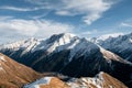 Snowy Greater Caucasus ridge. Sunny day. Before suset. View from 3500m Royalty Free Stock Photo