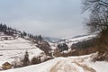 Winter mountains. Extreme path rural dirt road Royalty Free Stock Photo