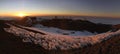 Snowy Hawaiian Sunset above the Clouds Royalty Free Stock Photo