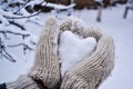 Snowy heart in woolen glove Royalty Free Stock Photo