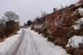 Snowy Hiking Trail views towards Lake Mountains Peak via Israel Canyon road towards Radio Towers in winter, Utah Lake, Wasatch Fro Royalty Free Stock Photo