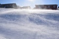 Snowy hill with drifting snow,