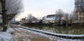 Snowy houses on the towpath of the Briare canal in Montargis