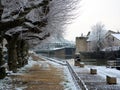 Snowy houses on the towpath of the Briare canal in Montargis