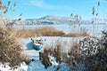 Snowy lake scene in Kastoria Greece