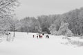 Snowy landscape with children