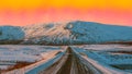 Snowy landscape with reddish sunset