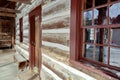 Snowy log cabin in the public park Royalty Free Stock Photo