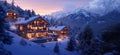 Snowy mountain chalets illuminated at dusk with stunning alpine backdrop Royalty Free Stock Photo