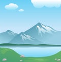Snowy mountain with clouds and lake with grass Royalty Free Stock Photo