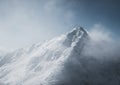 Snowy mountain landscape in cloudy weather near Rossland Range Royalty Free Stock Photo