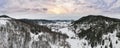 Panorama of mountain range winter landscape with sunset sky on Zlatibor, mountain resort, Serbia Royalty Free Stock Photo