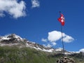 Alpine panorama with swiss flag Royalty Free Stock Photo